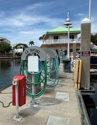 Diesel pump and dockside fuel hoses at Sunset Marina